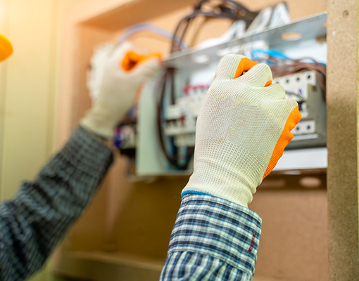 man is doing electrical circuit board service